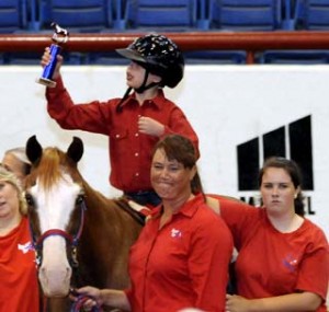 Be a part of helping  children to rehabilitate through the healing power of horses. Attend the American Paint Horse Foundation’s “Vaquero Gran Gala” benefit dinner, featuring therapeutic riding demonstrations Oct. 1 at Bell Mountain Stables in Castle Rock, Colorado. (APHA Photo/Megan Larson)